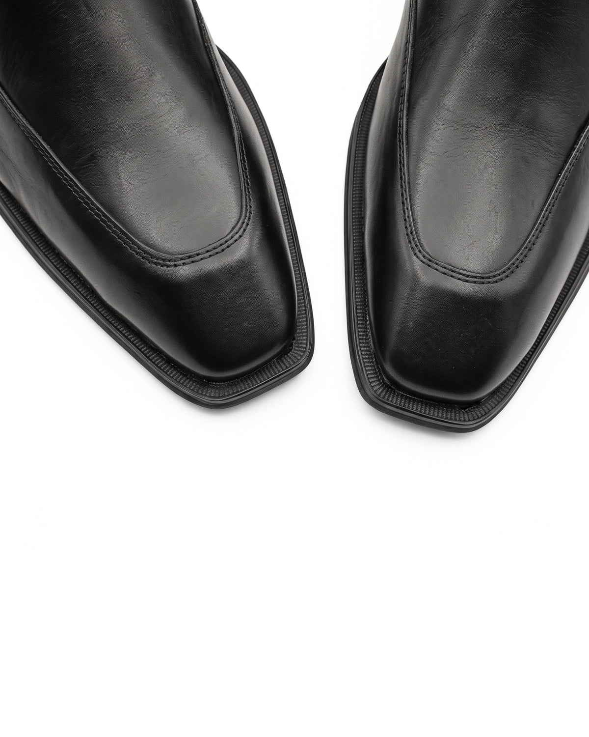 Massimo Cap-Toe Leather Chelsea Boots in Obsidian Black by Martin Germont, upper and toe detail